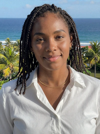Claudia, 30, Saint Lucian single from Vieux Fort with dark locs at a coastal lookout - verified dating profile